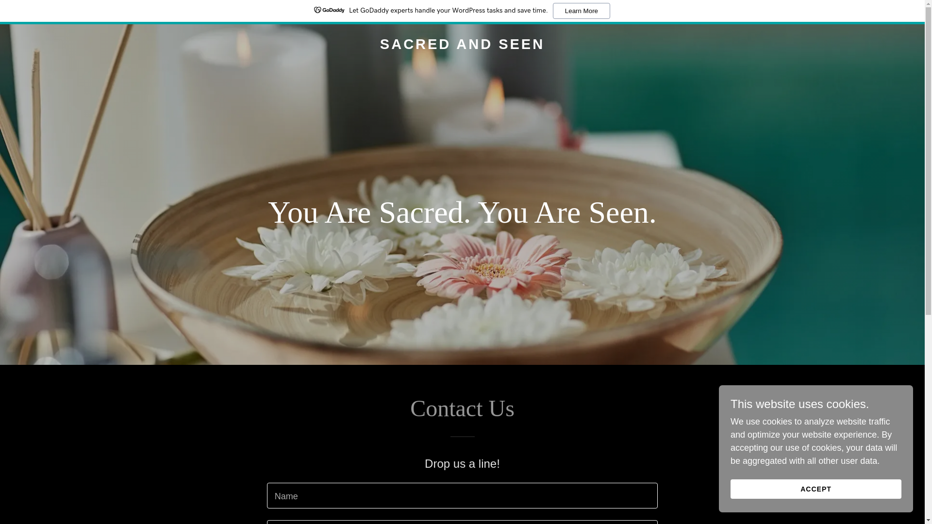 website screenshot of https://sacredandseen.co/