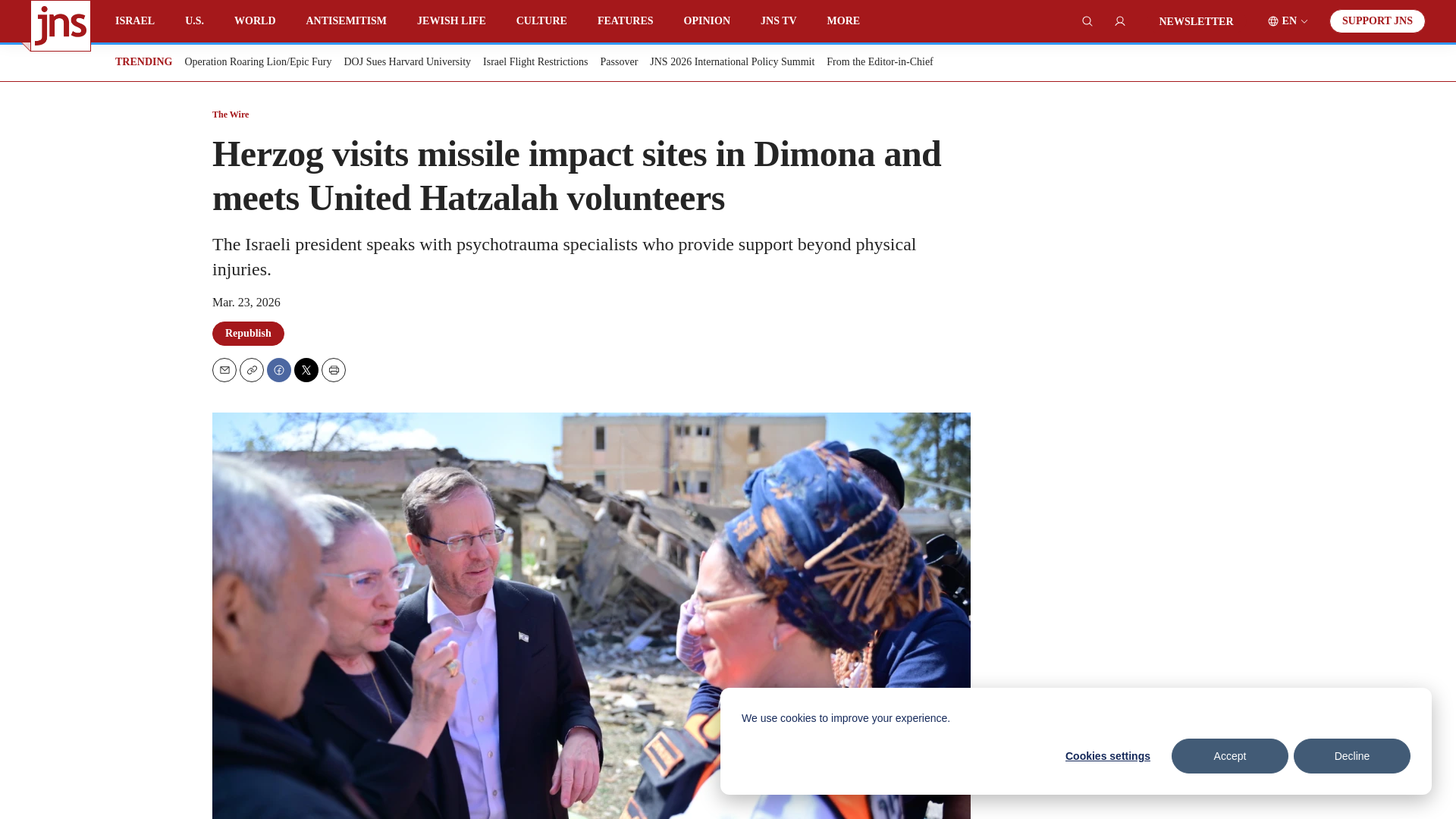 website screenshot of https://www.jns.org/wire/herzog-visits-missile-impact-sites-in-dimona-and-meets-united-hatzalah-volunteers