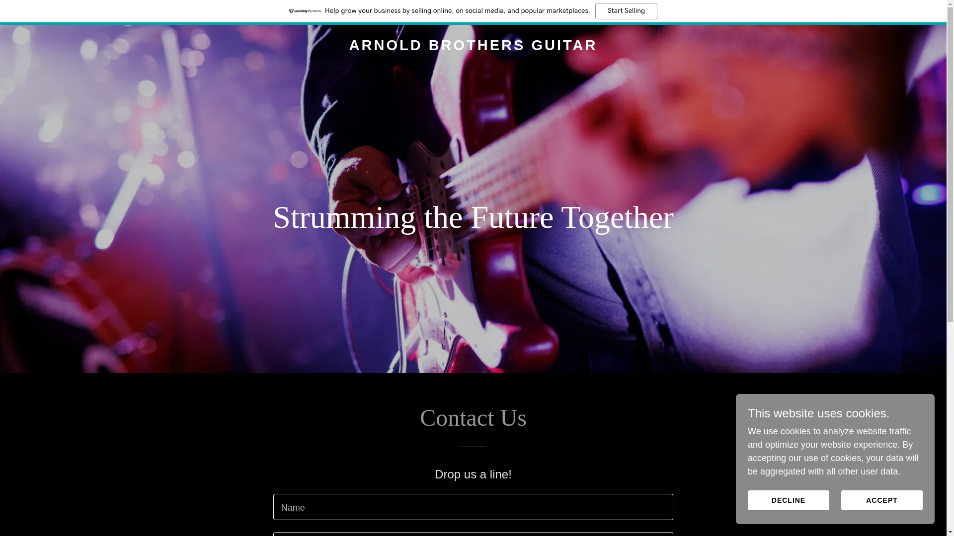 website screenshot of https://arnoldbrothersguitar.co.uk/