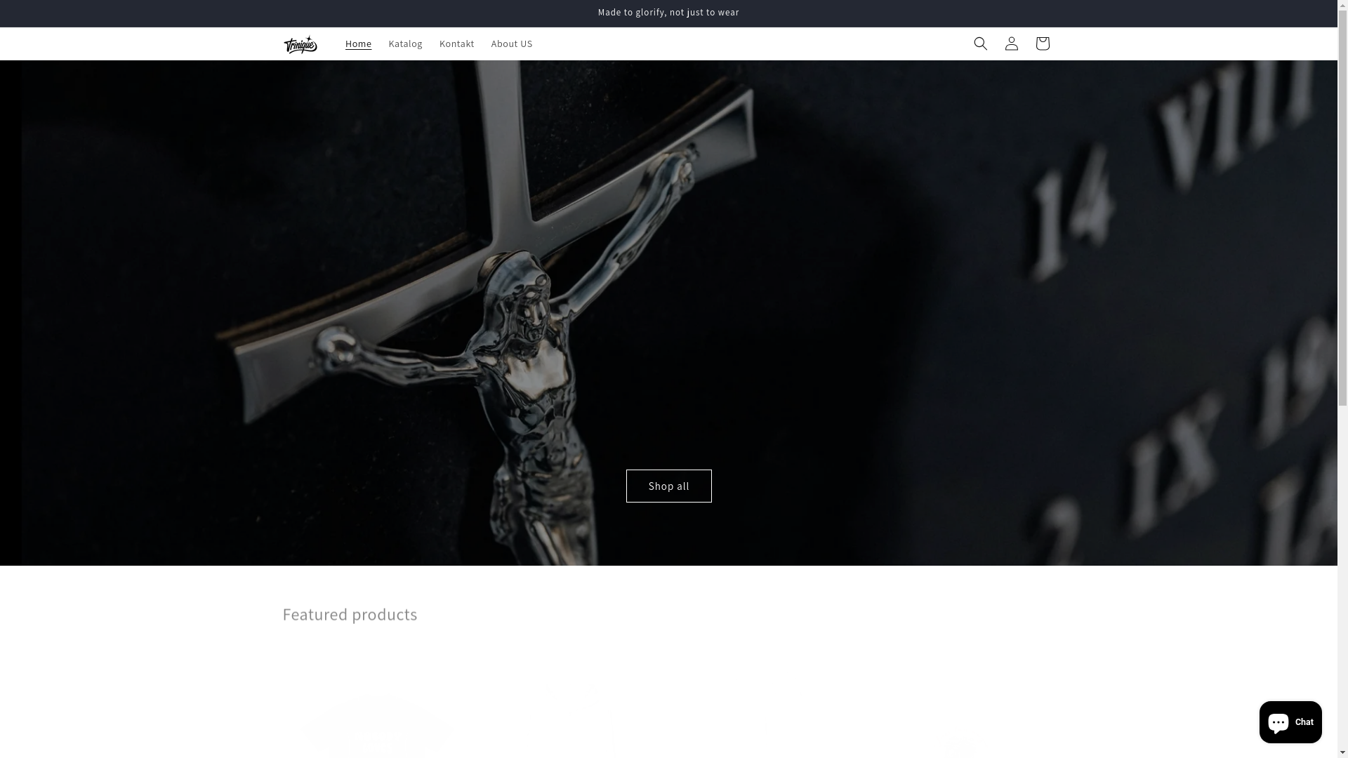 website screenshot of https://triniqueclothing.com/