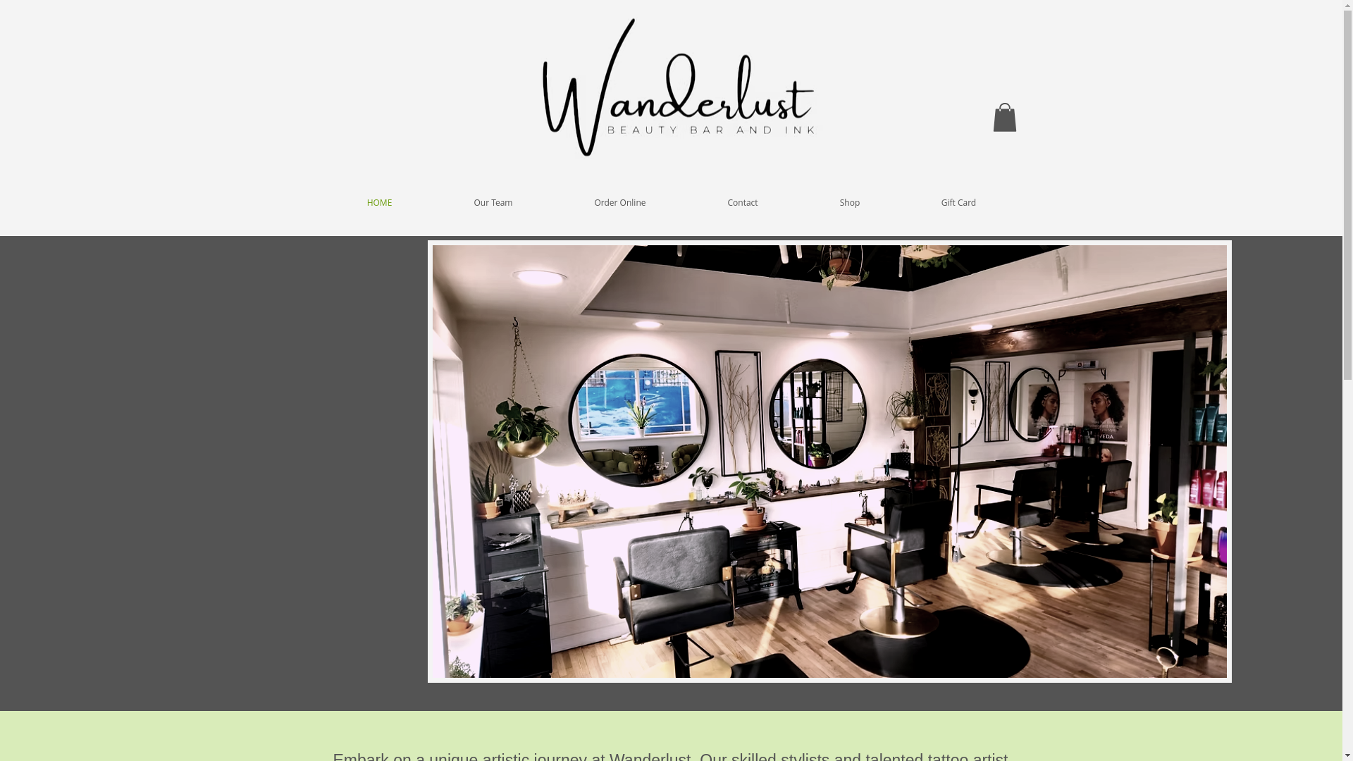 website screenshot of https://wanderlustbeautybarandink.com/