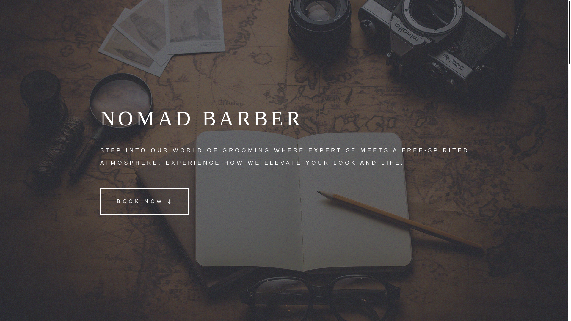 website screenshot of https://thenomdbarber.com/