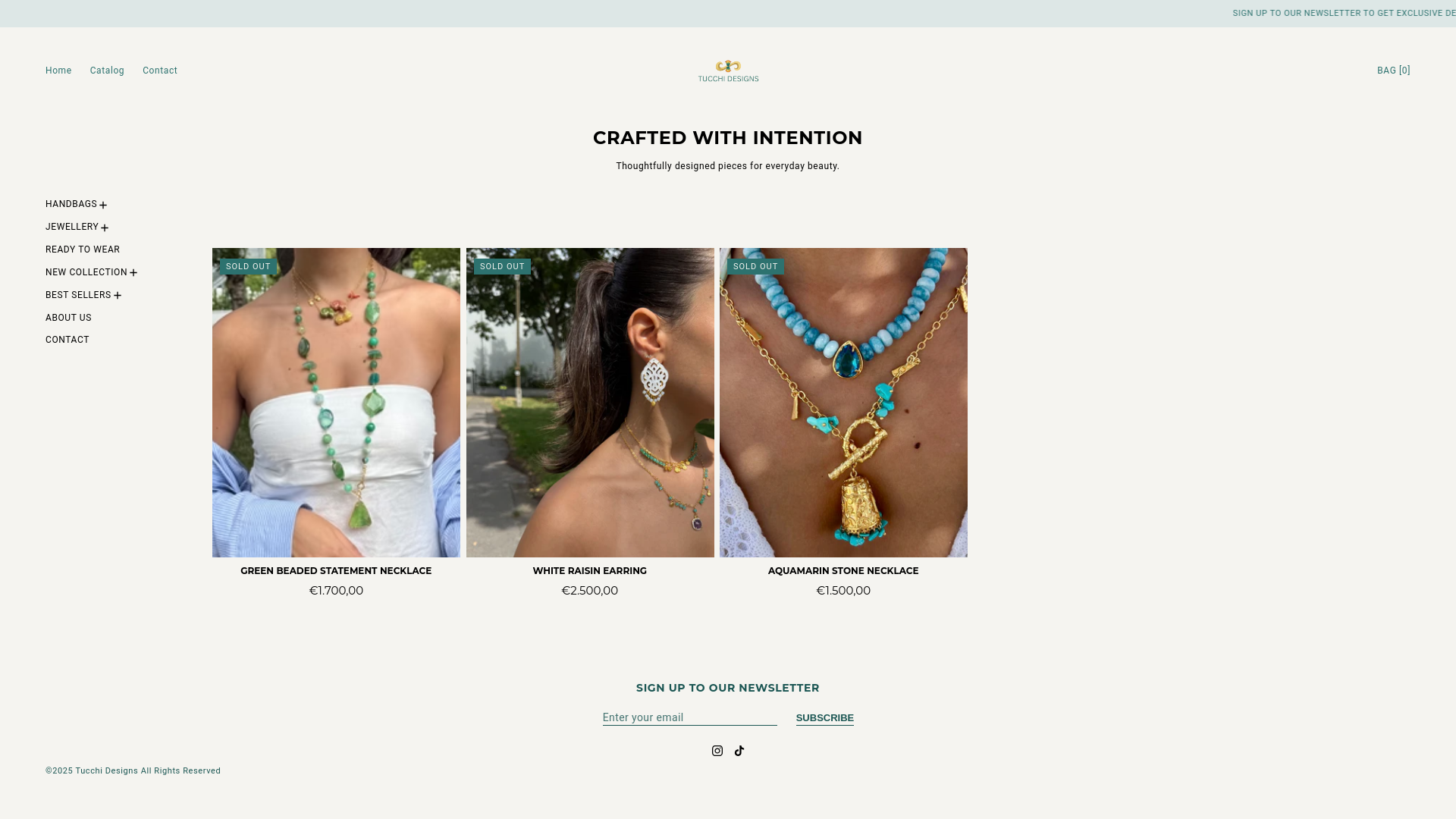 website screenshot of https://tucchidesigns.com